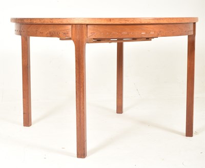 Lot 406 - NILS JONSSON, SWEDEN - MID CENTURY TEAK EXTENDING CIRCULAR DINING TABLE