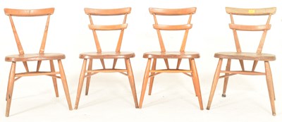 Lot 524 - FOUR MID CENTURY CIRCA 1960S OAK CHILDREN'S FAN BACK CHAIRS