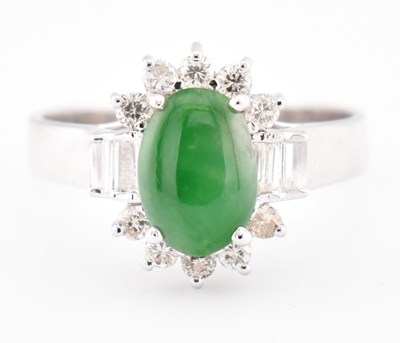 Lot 378 - 18CT WHITE GOLD JADE & DIAMOND HALO RING