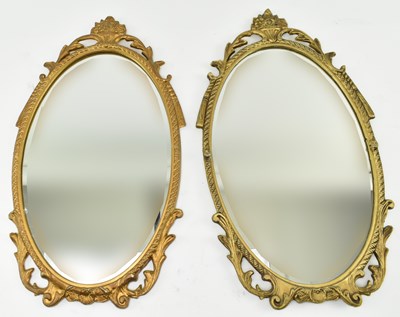Lot 239 - CAST CRAFT - MATCHING PAIR OF GILT METAL OVAL MIRRORS