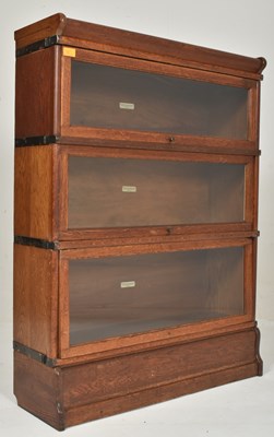 Lot 520 - GLOBE WERNICKE, LTD - EARLY 20TH CENTURY OAK LAWYERS BARRISTERS STACKING BOOKCASE