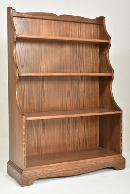 Lot 444 - ERCOL - 20TH CENTURY WATERFALL OPEN BOOKCASE