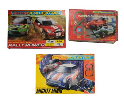 Lot 136 - SCALEXTRIC - X3 MICRO SCALEXTRIC SLOT CAR RACING SETS
