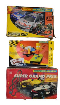 Lot 146 - SCALEXTRIC - X3 MICRO SCALEXTRIC SLOT CAR RACING SETS