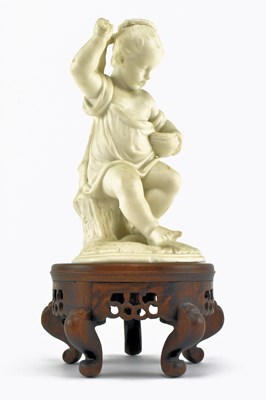 Lot 140 - 19TH CENTURY BISQUE FIGURINE CANDLE HOLDER RAISED ON WOODEN SOCLE BASE