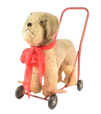Lot 354 - LINES BROS PUSH WALK ALONG DOG ON WHEELS
