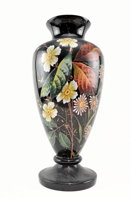 Lot 158 - LATE VICTORIAN BLACK PAINTED CERAMIC FOOTED VASE WITH FLORAL DISPLAY
