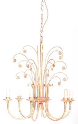 Lot 429 - PAIR OF HOLLYWOOD REGENCY STYLE GILDED METAL SIX ARM CHANDELIERS