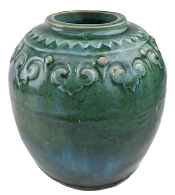 Lot 164 - QING DYNASTY GREEN GLAZED EARTHENWARE JAR 清 绿釉陶如意纹罐