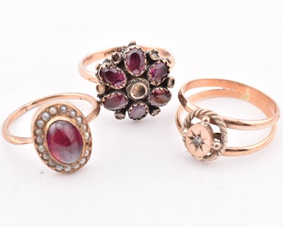 Lot 283 - THREE 9CT ROSE GOLD & GEM SET RINGS