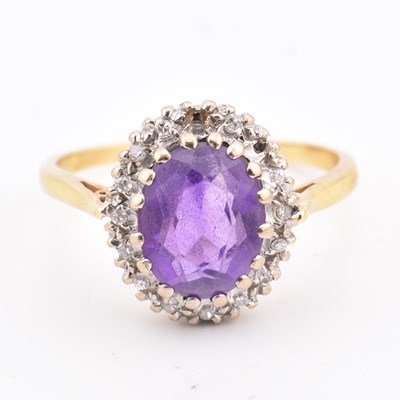 Lot 307 - 18CT GOLD AMETHYST & DIAMOND CLUSTER RING