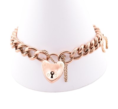 Lot 103 - HALLMARKED 9CT ROSE GOLD ENGRAVED CHARM BRACELET
