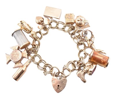 Lot 8 - HALLMARKED 9CT GOLD CHARM BRACELET