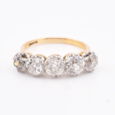 Lot 35 - 18CT GOLD & PLATINUM DIAMOND FIVE STONE RING