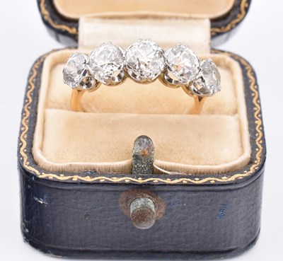 Lot 35 - 18CT GOLD & PLATINUM DIAMOND FIVE STONE RING