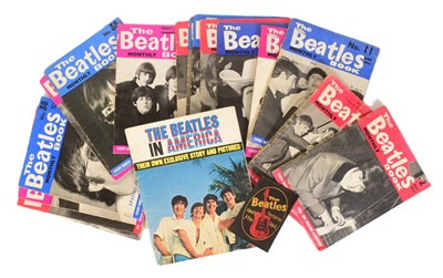Lot 101 - THE BEATLES - COLLECTION OF BEATLES MONTHLY MAGAZINES & CLOTH PATCH