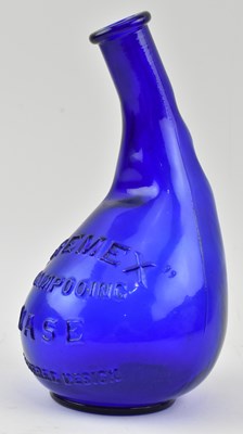 Lot 181 - CREMEX SHAMPOOING - EARLY 20TH CENTURY BLUE GLASS BOTTLE