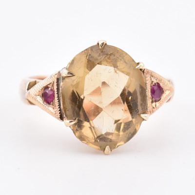 Lot 409 - 18CT GOLD CITRINE & RUBY RING