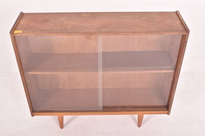 Lot 587 - BRITISH MODERN DESIGN - RETRO MID CENTURY TEAK & GLASS BOOKCASE CABINET