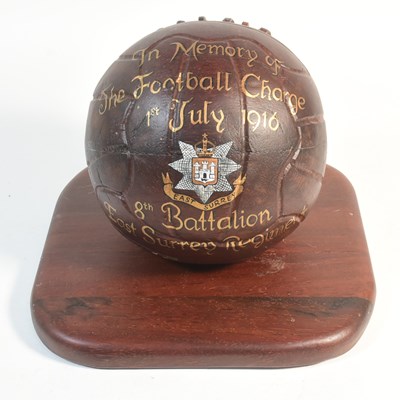 Lot 36 - BATTLE OF THE SOMME - WOODEN FOOTBALL CHARGE ORNAMENT DEDICATION