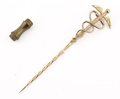 Lot 228 - HALLMARKED 9CT GOLD CADUCEUS STICK PIN