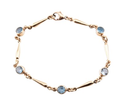 Lot 186 - HALLMARKED 9CT GOLD & TOPAZ LINE BRACELET