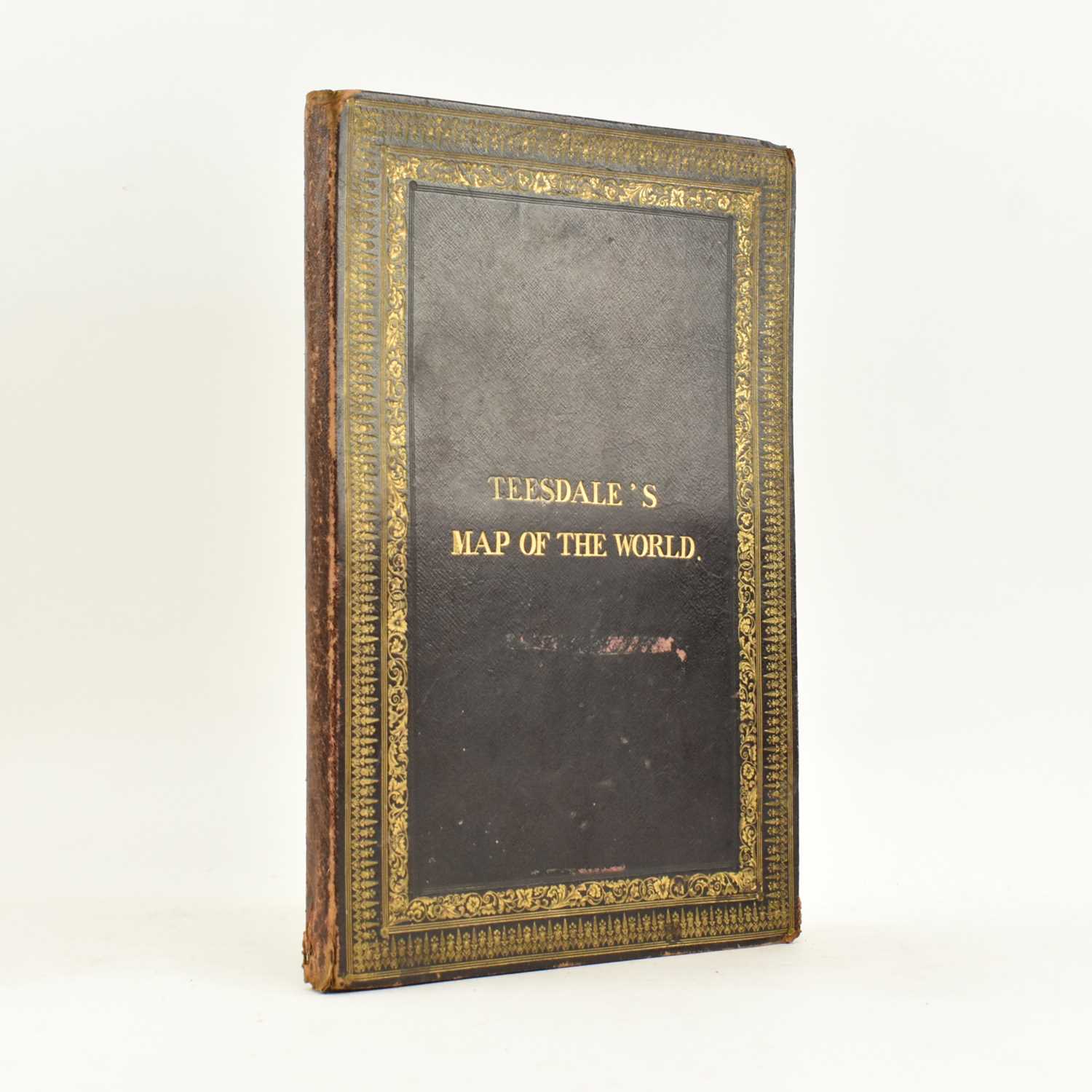 Lot 305 - WORLD MAP. 1845 A NEW CHART OF THE WORLD BY HENRY TEESDALE FOLDING MAP IN ORIG. MOROCCO BOARDS