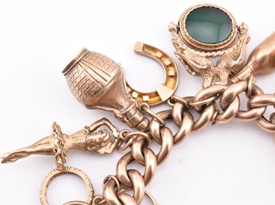 Lot 18 - HALLMARKED 9CT GOLD CHARM BRACELET