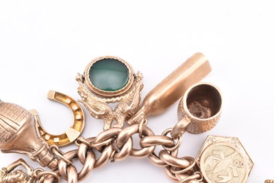 Lot 18 - HALLMARKED 9CT GOLD CHARM BRACELET