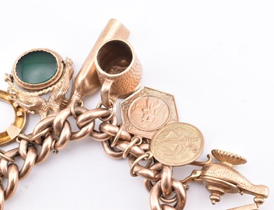 Lot 18 - HALLMARKED 9CT GOLD CHARM BRACELET