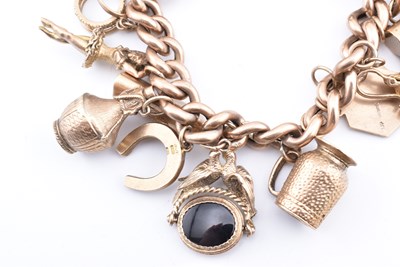 Lot 18 - HALLMARKED 9CT GOLD CHARM BRACELET