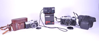 Lot 396 - THREE LATE 20TH CENTURY OLYMPUS FILM CAMERAS & LENS