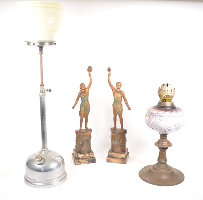 Lot 328 - TWO 20TH CENTURY OIL LAMPS AND TWO SPELTER FIGURES OF TORCH BEARERS
