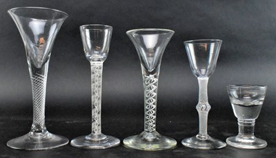 Lot 98 - FIVE 18TH C & LATER DRINKING GLASSES, FOUR FEATURING TWIST STEMS