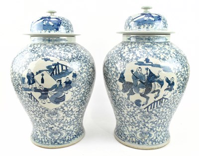 Lot 125 - PAIR OF CHINESE BLUE AND WHITE BALUSTER VASES WITH COVER 青花莲花纹人物盖瓶一对