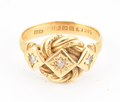Lot 351 - GEORGE V 18CT GOLD & DIAMOND KNOT RING