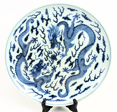 Lot 10 - LARGE QING DYNASTY GUANGXU BLUE AND WHITE 'DRAGON' CHARGER 清 光绪青花龙纹大盘