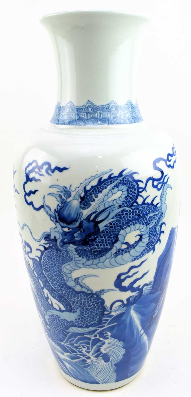 Lot 40 - QING DYNASTY BLUE AND WHITE BALUSTER VASE 清 青花龙纹瓶