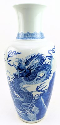 Lot 40 - QING DYNASTY BLUE AND WHITE BALUSTER VASE 清 青花龙纹瓶