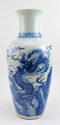 Lot 40 - QING DYNASTY BLUE AND WHITE BALUSTER VASE 清 青花龙纹瓶