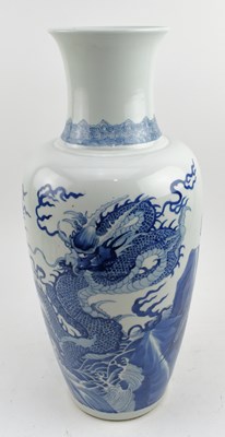 Lot 40 - QING DYNASTY BLUE AND WHITE BALUSTER VASE 清 青花龙纹瓶