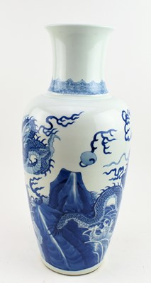 Lot 40 - QING DYNASTY BLUE AND WHITE BALUSTER VASE 清 青花龙纹瓶
