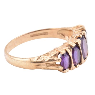 Lot 128 - HALLMARKED 9CT GOLD & AMETHYST FIVE STONE RING
