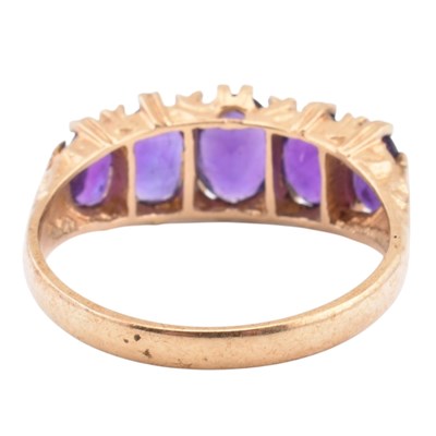 Lot 128 - HALLMARKED 9CT GOLD & AMETHYST FIVE STONE RING