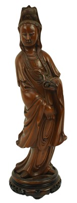 Lot 128 - A CHINESE BOXWOOD CARVING FIGURINE OF STANDING GUANYIN 花梨木观音立像