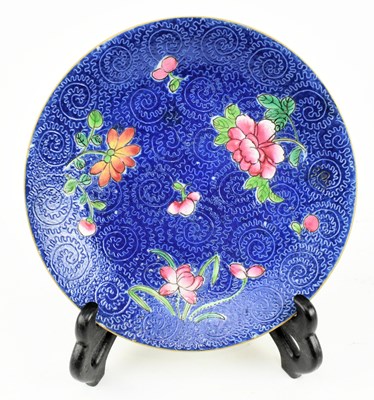 Lot 59 - QING JIAQING PERIOD FAMILLE ROSE DISH 清 嘉庆蓝地粉彩轧道花卉盘
