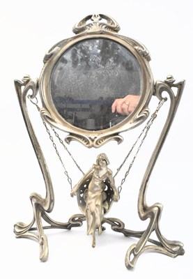 Lot 56 - ART NOUVEAU EARLY 20TH CENTURY SILVERED METAL SWING MIRROR, STAMPED ERTE
