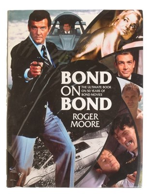 Lot 21 - JAMES BOND 007 - 'BOND ON BOND' - ROGER MOORE SIGNED LIMITED EDITION BOOK
