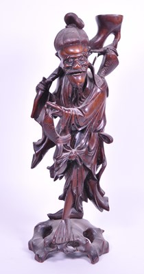 Lot 216 - 20TH CENTURY CHINESE HARDWOOD FISHERMAN FIGURE