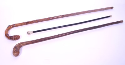 Lot 219 - THREE 20TH CENTURY WALKING STICKS